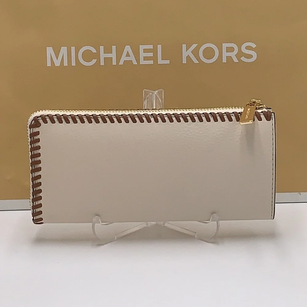 MICHAEL KORS JET SET TRAVEL LARGE THREE QUARTER ZIP WALLET LIGHT CREAM MULTI